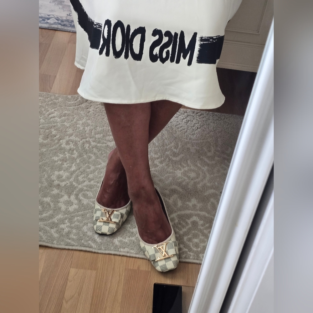 Louis Vuitton Flats with Gold Accent